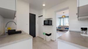 TV a/nebo společenská místnost v ubytování Stilo Dom - Plac Grunwaldzki