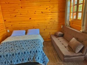 Ένα ή περισσότερα κρεβάτια σε δωμάτιο στο Refúgio 370