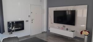 Telewizja i/lub zestaw kina domowego w obiekcie APARTAMENTO CENTRICO