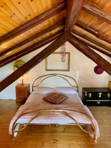 a bedroom with a large bed in a attic at Vila Loralina - Izola - direct Sea view in Izola