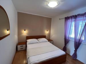 Postel nebo postele na pokoji v ubytování Ana Exclusive Apartments
