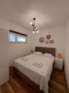 Lova arba lovos apgyvendinimo įstaigoje Apartments MilaRoza