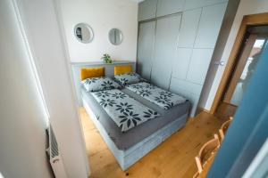 Posteľ alebo postele v izbe v ubytovaní Relax