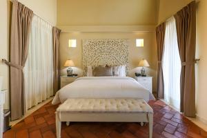 Postel nebo postele na pokoji v ubytování Hotel Casa Canabal by Faranda Boutique