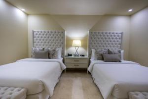 Postel nebo postele na pokoji v ubytování Hotel Casa Canabal by Faranda Boutique