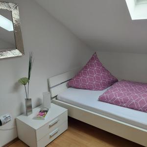 Postel nebo postele na pokoji v ubytování Wohlfühlapartment Erlenberg