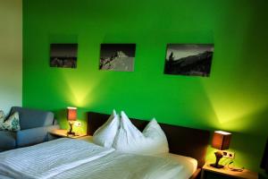 Ein Bett oder Betten in einem Zimmer der Unterkunft Apart Bergwärts
