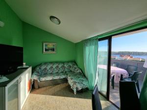 TV a/nebo společenská místnost v ubytování Apartment Grbac