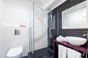 Kúpeľňa v ubytovaní Aparment Lila + 25 fotografií