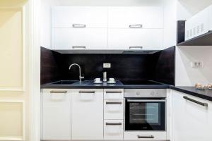 Kuchyňa alebo kuchynka v ubytovaní Aparment Lila