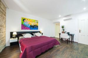 Posteľ alebo postele v izbe v ubytovaní Aparment Lila