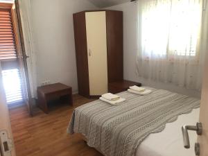 Postel nebo postele na pokoji v ubytování Apartman Sternak