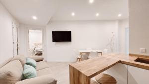 Telewizja i/lub zestaw kina domowego w obiekcie Reposo Sweet Home & Free Parking