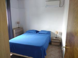 Postel nebo postele na pokoji v ubytování Maison chaleureuse avec vue sur mer