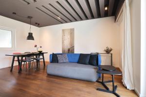 Posezení v ubytování Apartment F