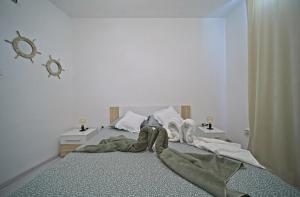 Giường trong phòng chung tại Apartment Vita