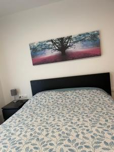 Llit o llits en una habitació de Precioso cálido apartamento en Sort con terraza