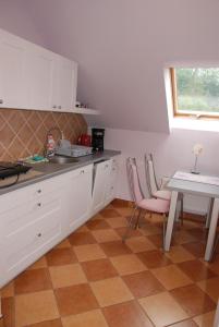 Una cocina o cocineta en Apartament Vistula