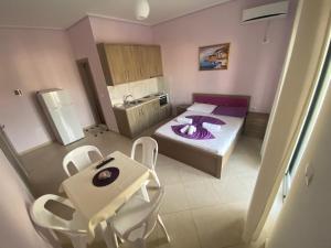 Postel nebo postele na pokoji v ubytování Hotel Vila Ali