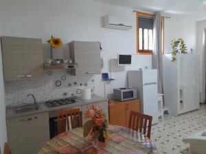 Kuchyň nebo kuchyňský kout v ubytování Casa Vacanza DaRó