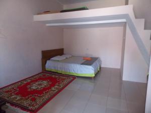 Letto o letti in una camera di Hotel Putra Sindang Asih