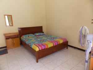 Letto o letti in una camera di Hotel Putra Sindang Asih