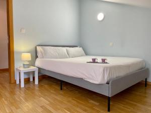 Säng eller sängar i ett rum på Ático Dúplex Río Ebro