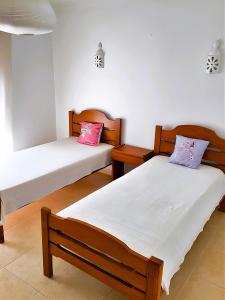 Ένα ή περισσότερα κρεβάτια σε δωμάτιο στο 1 Bedroom Apartment Chaves, Praceta Vitorino Nemesio, Albufeira