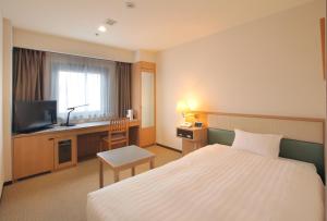 TV a/nebo společenská místnost v ubytování Odakyu Station Hotel Hon-Atsugi