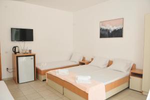 TV a/nebo společenská místnost v ubytování Guest House Marković