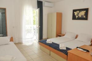 Postel nebo postele na pokoji v ubytování Guest House Marković