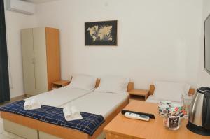 Postel nebo postele na pokoji v ubytování Guest House Marković