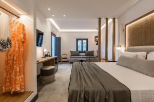 Postel nebo postele na pokoji v ubytování Vineyard Exclusive Suites + 37 fotografií