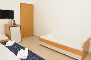 Postel nebo postele na pokoji v ubytování Guest House Marković