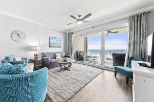 a living room with a view of the ocean at Regency Isle Unit 307 in Orange Beach