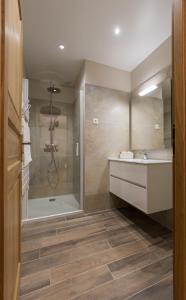 a bathroom with a shower and a sink at LA VALLEE JOLY in Le Vast