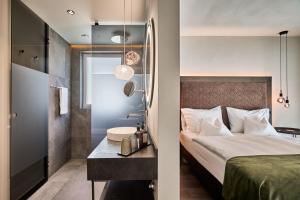 Appius Design Suites B&B - ADULTS ONLY客房内的一张或多张床位