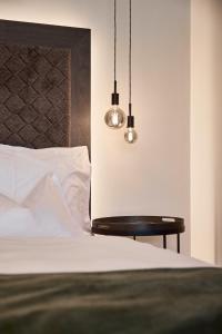 Appius Design Suites B&B - ADULTS ONLY客房内的一张或多张床位