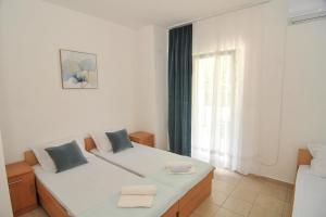 Postel nebo postele na pokoji v ubytování Guest House Marković
