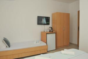 Postel nebo postele na pokoji v ubytování Guest House Marković