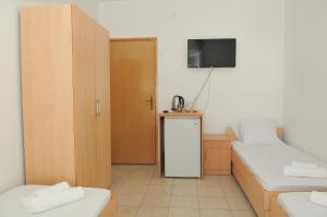 Postel nebo postele na pokoji v ubytování Guest House Marković