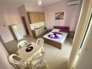 Postel nebo postele na pokoji v ubytování Hotel Vila Ali