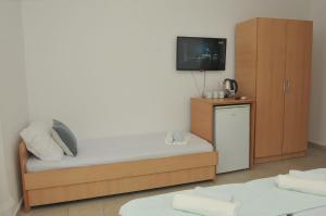Postel nebo postele na pokoji v ubytování Guest House Marković