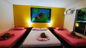 Letto o letti in una camera di Hotel Aurora