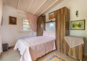 Tempat tidur dalam kamar di Windy Hill Selimiye