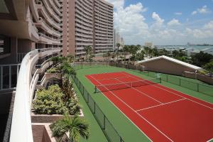 a tennis court on top of a building at Crescent Beach Club I 15B in Clearwater Beach