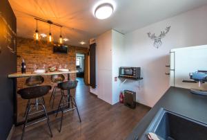 Kuchyňa alebo kuchynka v ubytovaní Apartament Wita Stwosza