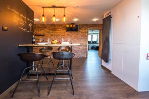 Kuchyňa alebo kuchynka v ubytovaní Apartament Wita Stwosza