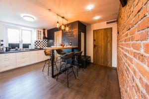 Kuchyňa alebo kuchynka v ubytovaní Apartament Wita Stwosza