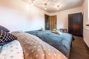 Posteľ alebo postele v izbe v ubytovaní Apartament Wita Stwosza + 30 fotografií